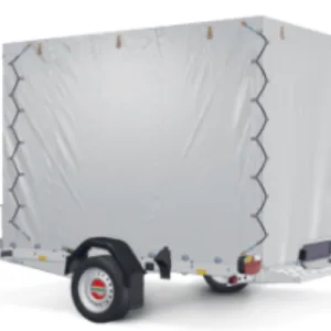White enclosed cargo trailer on a small hitch-mounted trailer, visible rear ramp and wheel, ready for transport