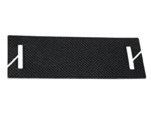 Black textured rectangular plate with diagonal pattern and white stylized end markers on both sides, showing cutouts.