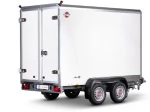 White cargo trailer with dual rear doors, chrome hinges, and a STEM A logo at the back corner; two-axle trailer with black fenders and rear lights visible