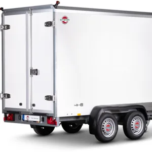 White cargo trailer with dual rear doors, chrome hinges, and a STEM A logo at the back corner; two-axle trailer with black fenders and rear lights visible